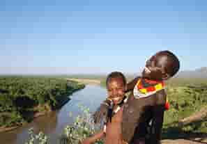 Two happy laughing tribal boys